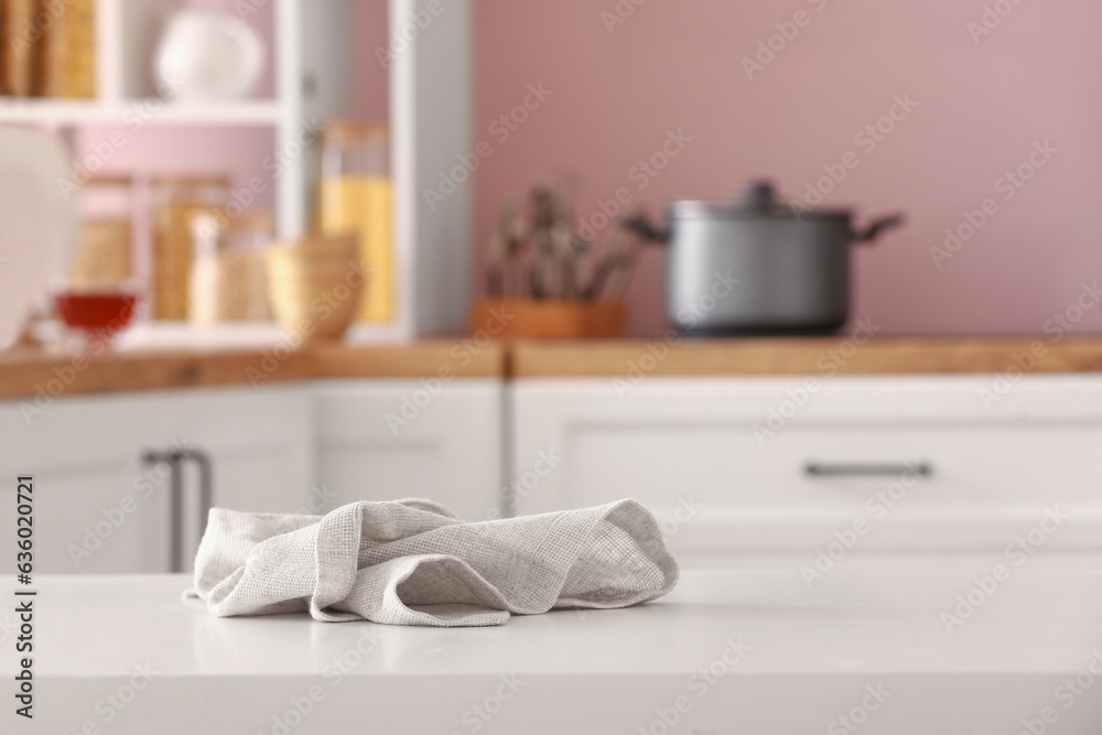 Crumpled napkin on table in kitchen