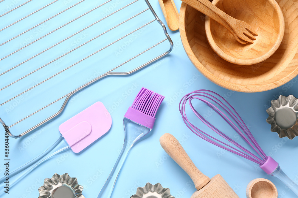 Baking utensils on blue background