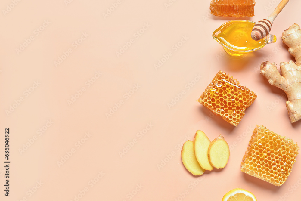 Gravy boat with sweet honey, combs  and ginger on pink background