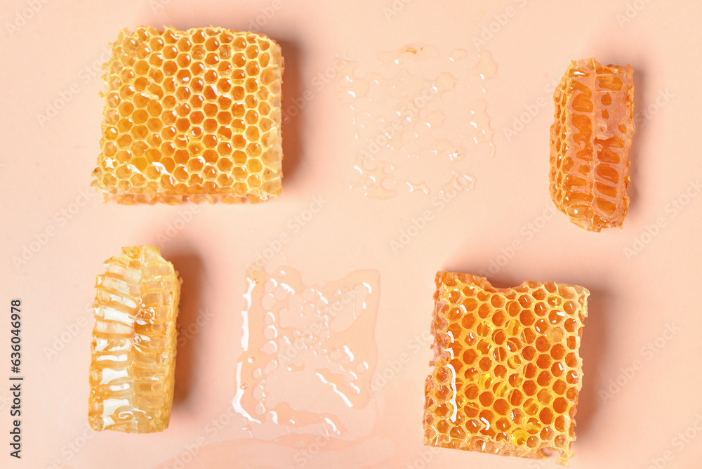 Sweet honeycombs on pink background