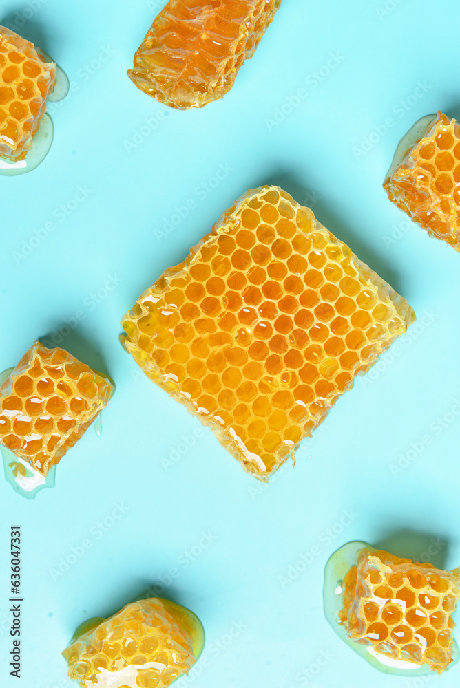 Sweet honeycombs on blue background