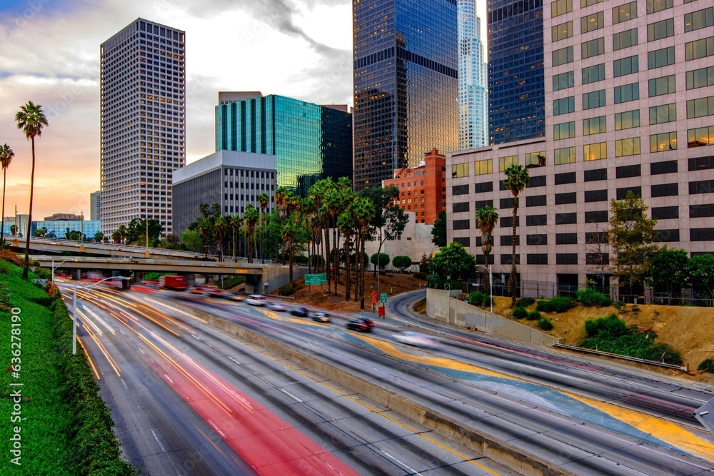 Dawning Urban Energy: 4K Image of Los Angeles Downtown and Morning Traffic at Sunrise