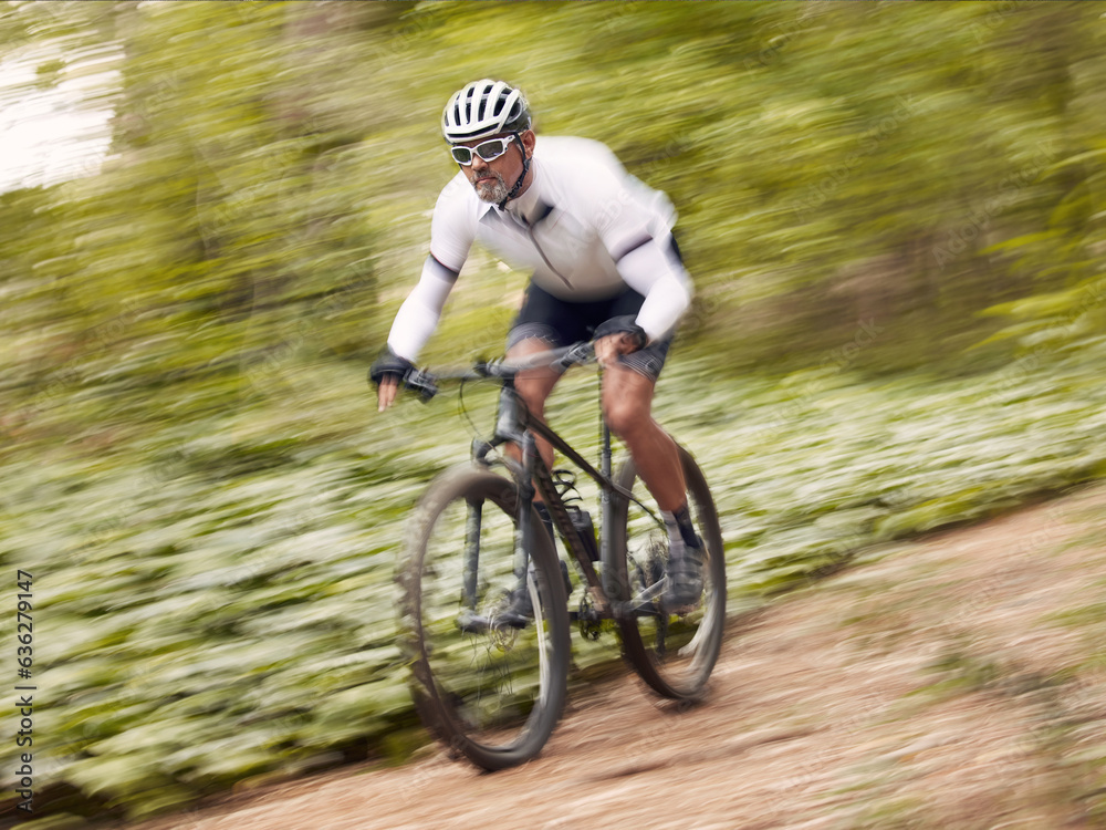 Fast, cycling and man on a bike in nature for fitness, sports or a competition. Energy, mountains an