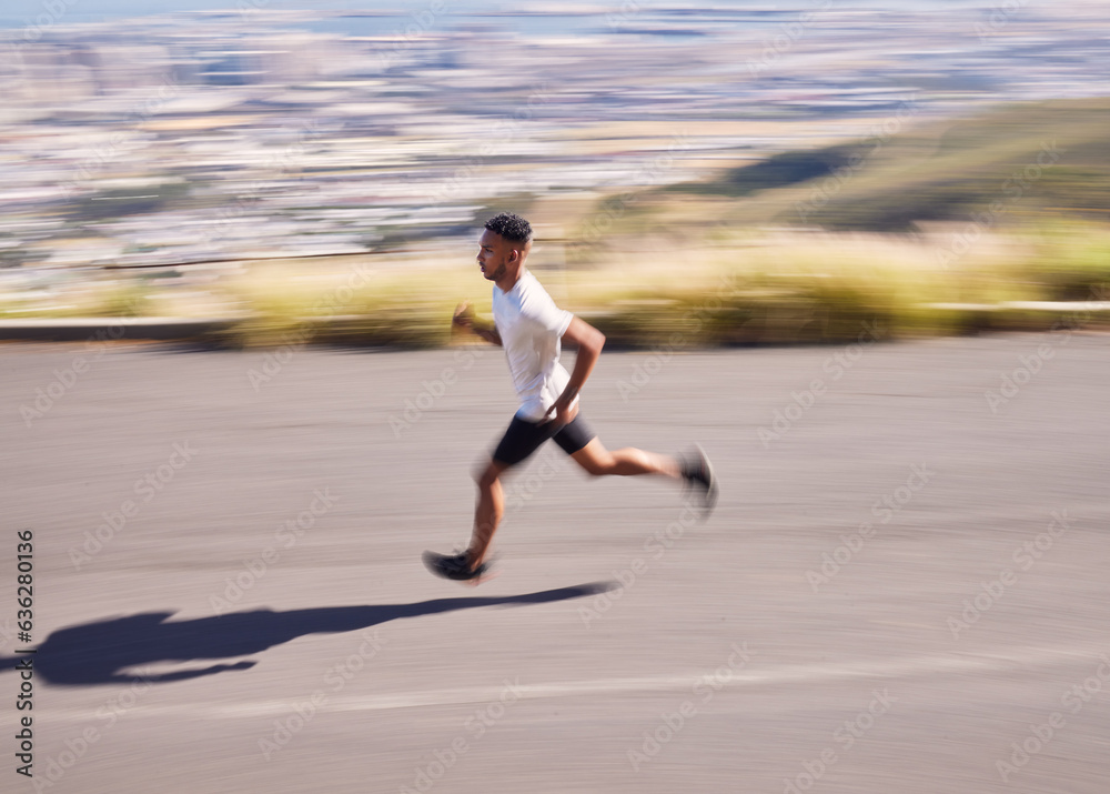 Fitness, running and motion blur with a sports man on a road for his cardio or endurance workout. Ex