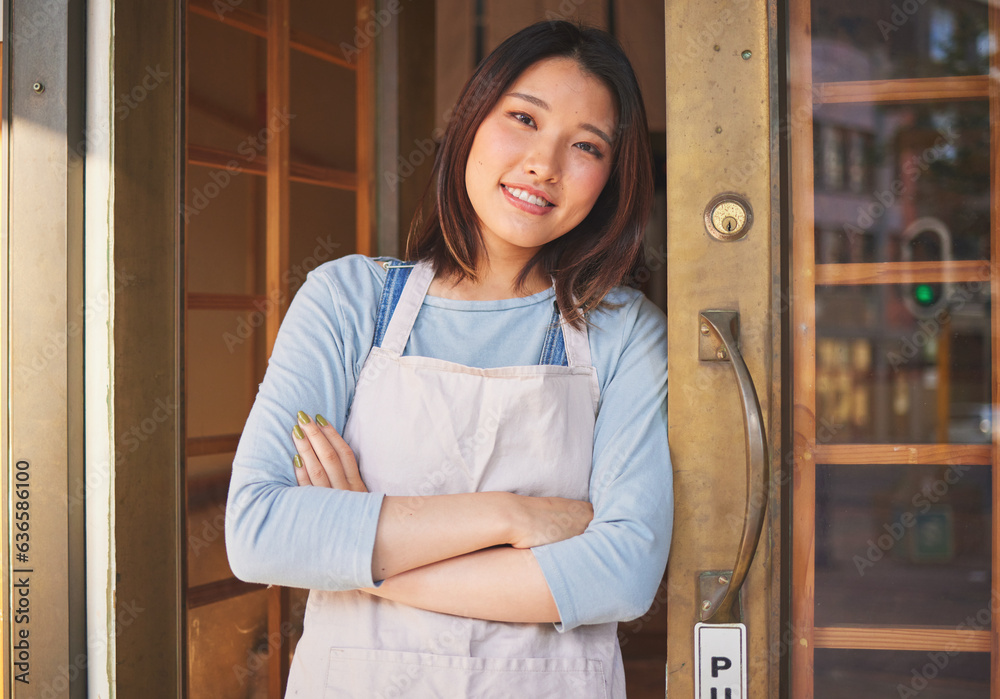 Portrait, waitress and Asian woman with arms crossed at door of restaurant, coffee shop or store. Fa