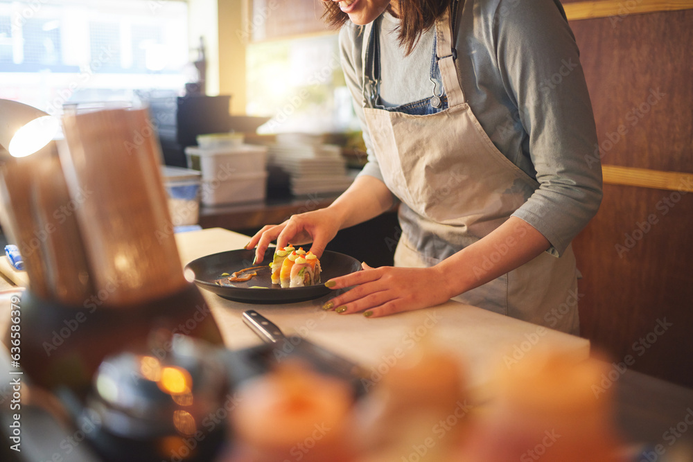 Sushi chef, restaurant and ready in kitchen with hands, service or plate on table, job or catering. 