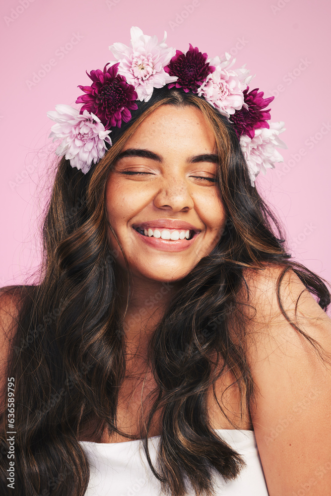 Woman, flowers and smile with crown on pink background for natural beauty, skincare and self care in