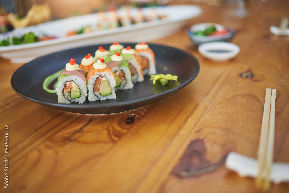 Restaurant, meal and closeup of sushi on a plate for luxury, healthy and authentic Asian cuisine. Pl