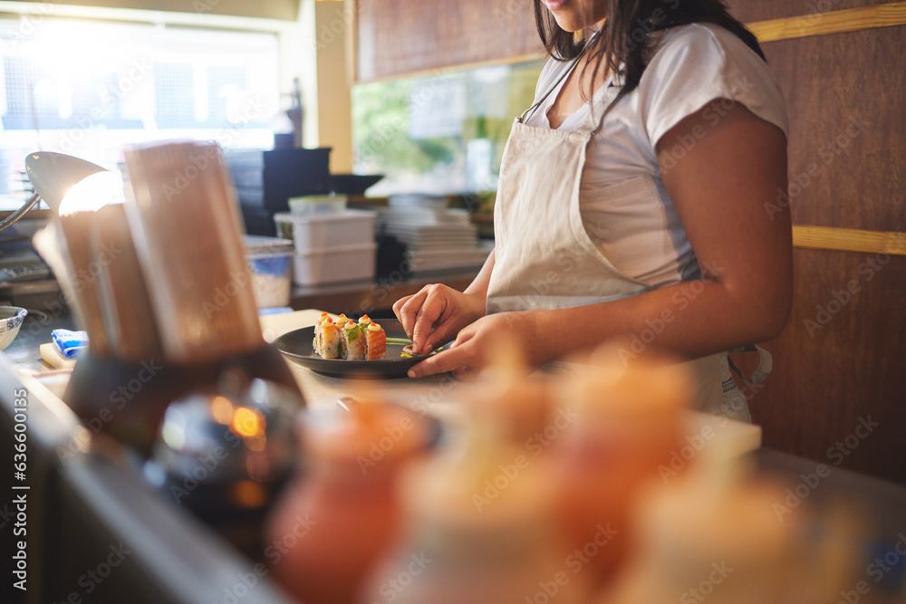 Cooking, sushi and chef with hands of person in restaurant for seafood, Japanese cuisine and nutriti