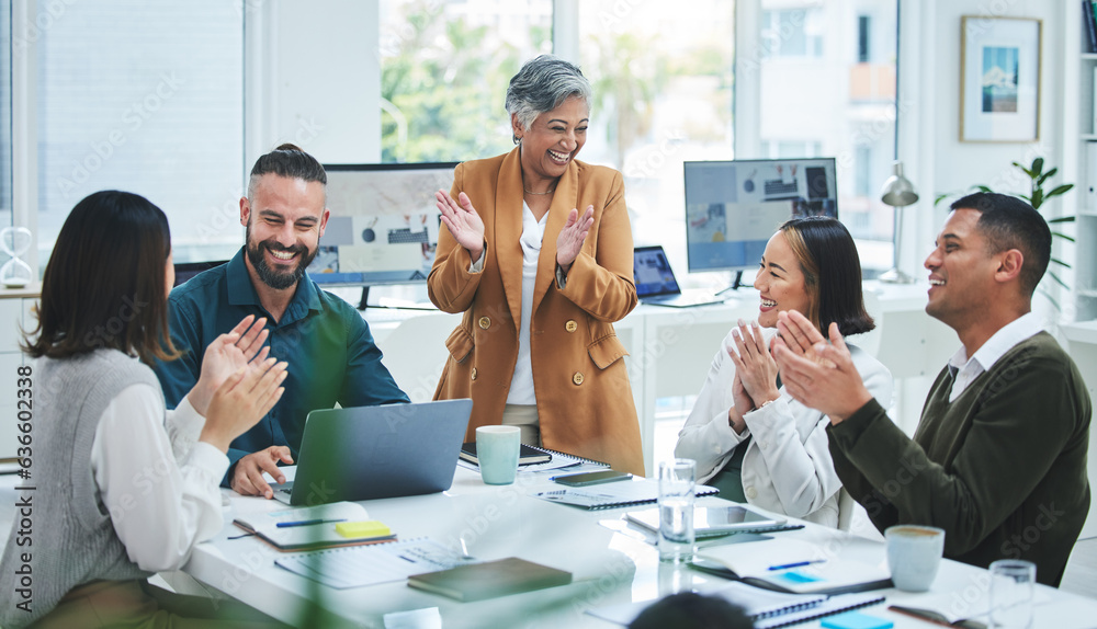 Happy business people in meeting at desk with applause, cheers and celebration of sales target achie