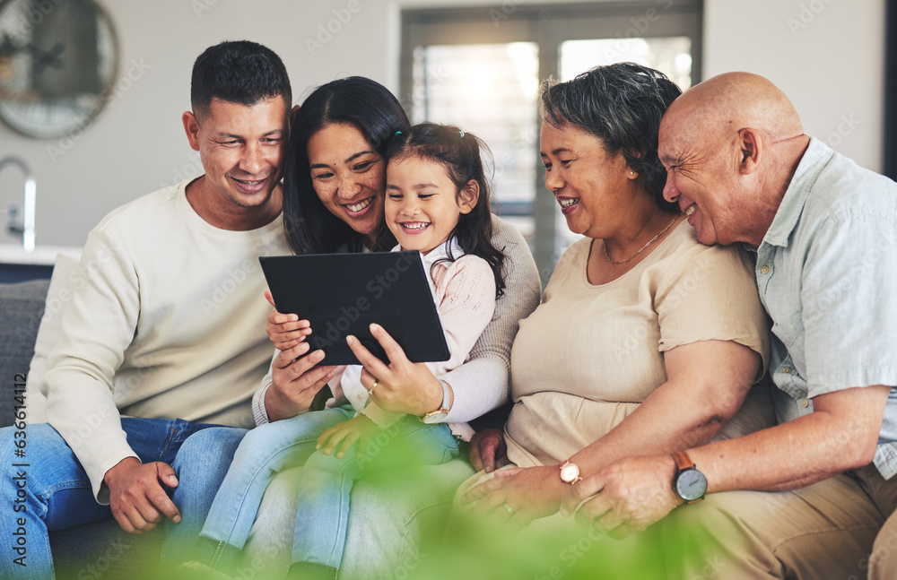 Tablet, family and children on a sofa in the living room together during a visit with grandparents i