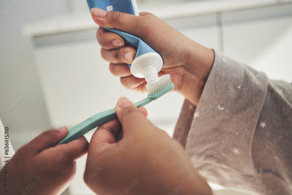 Hands, brushing teeth and a parent teaching a child about dental care with a family in a bathroom to