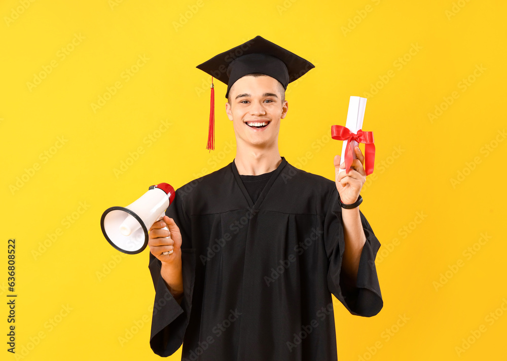 Male graduate student with diploma and megaphone on yellow background