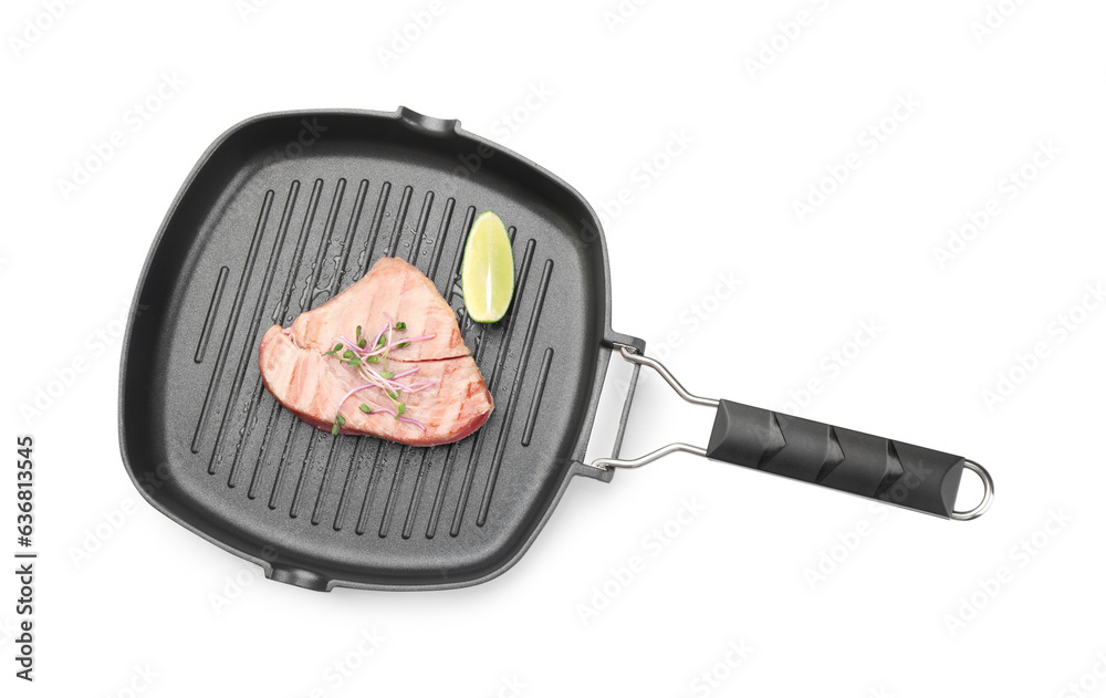 Delicious tuna steak with lime in grill pan on white background, top view