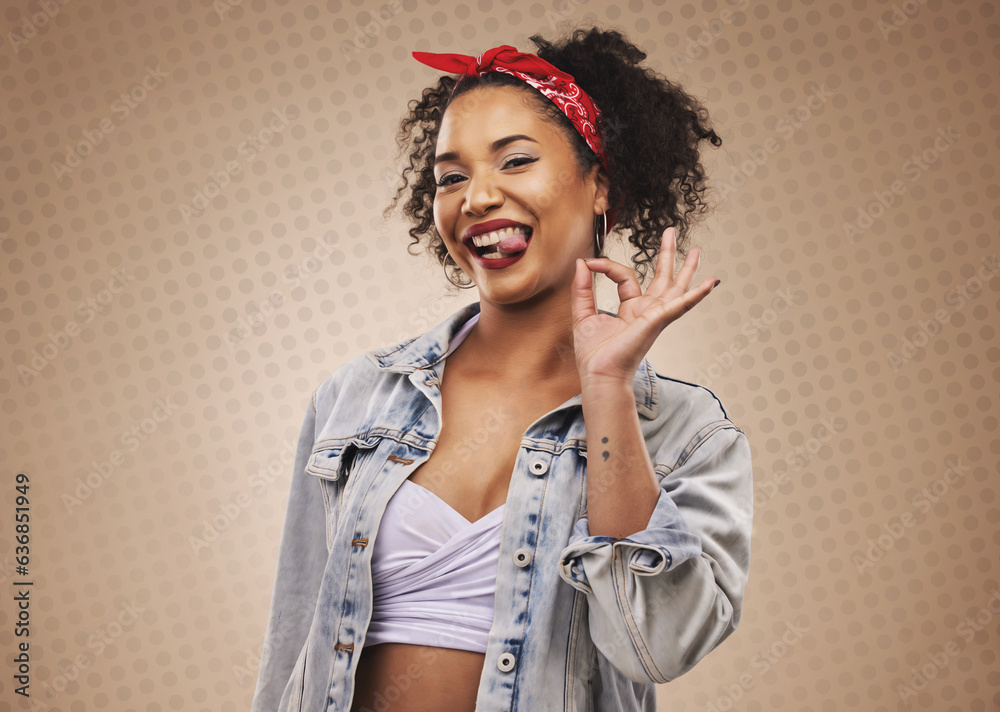 Woman, ok sign and studio portrait with smile, tongue and funny face for good review by brown backgr