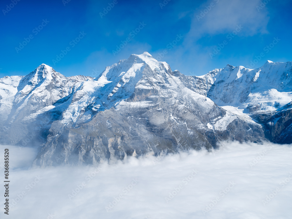 Mountain scenery in the Swiss Alps. Mountains peaks. Natural landscape. Mountain range and clear blu