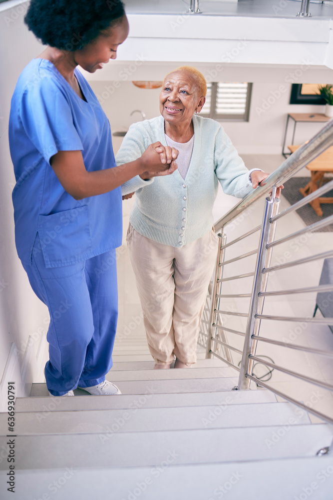 Caregiver, stairs and elderly woman holding hands, help and assistance in home. Nurse, steps and sen