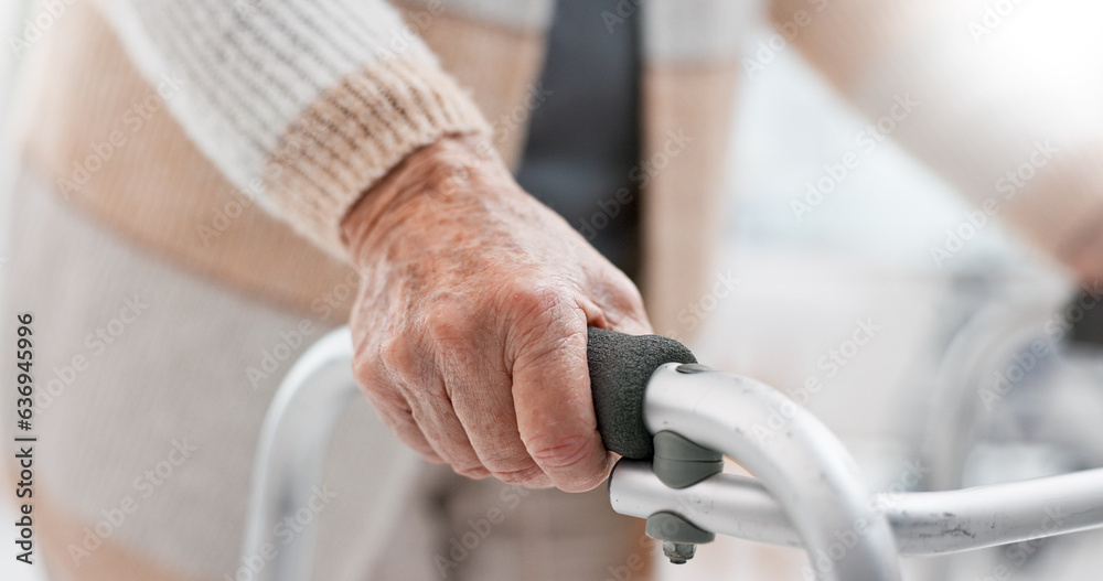 Hands, walker and an old person with a disability in recover or rehabilitation in a clinic for mobil