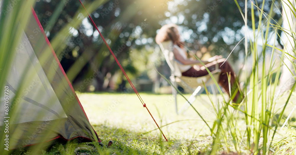 Nature, camp and woman sitting in a park, forest or the woods in the morning to relax with fresh air