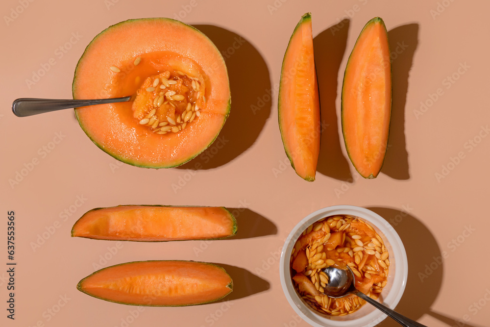 Ripe cut melon on orange background