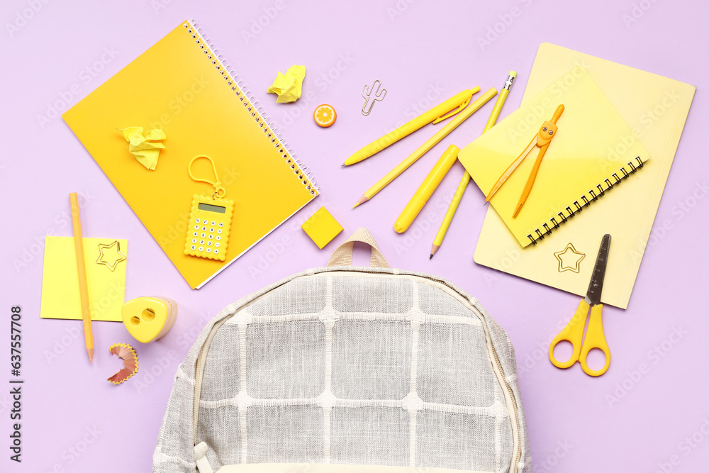 Stylish school backpack with different stationery supplies on lilac background