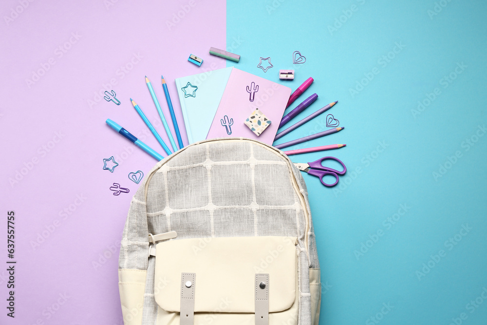 Stylish school backpack with different stationery supplies on colorful background