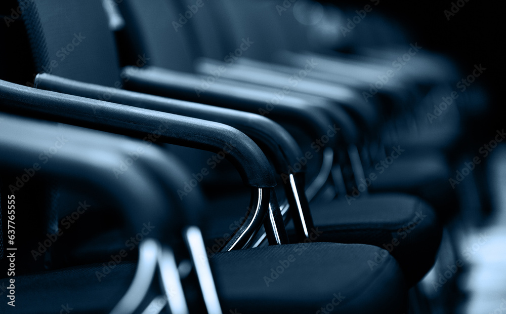 Row of chairs in meeting room