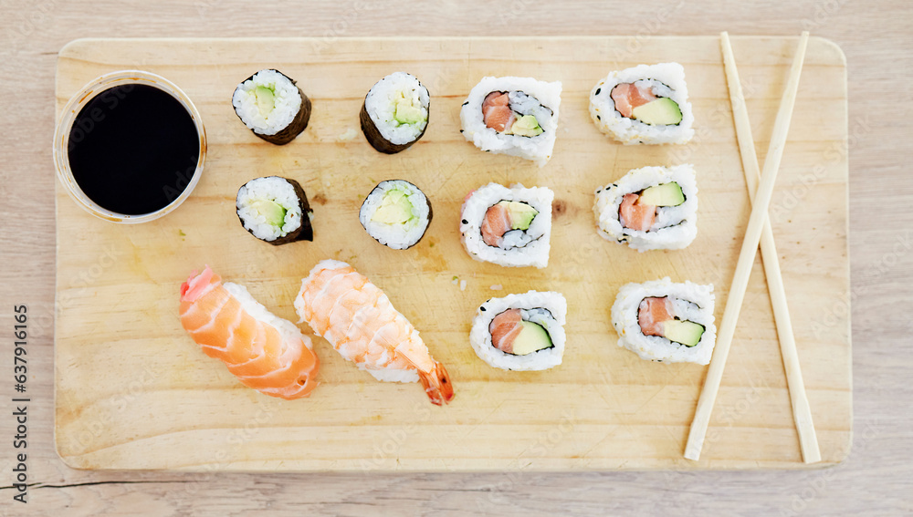 Sushi, top view and soy sauce with food on wood board, closeup with salmon and rice, healthy and lux