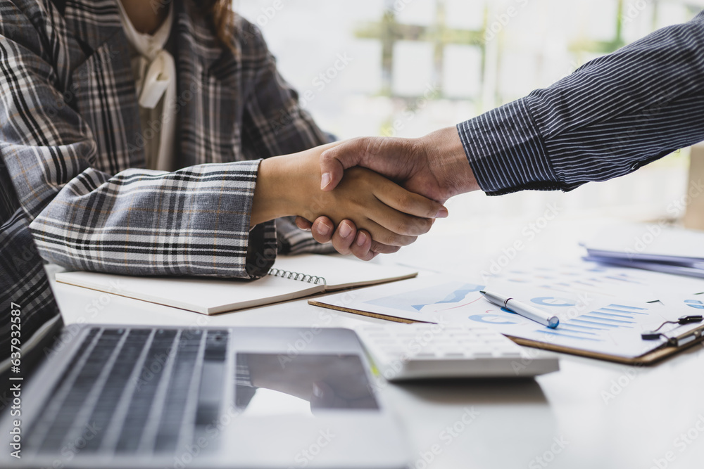 Business meeting, businessman shaking hands in business partnership meeting, business cooperation.