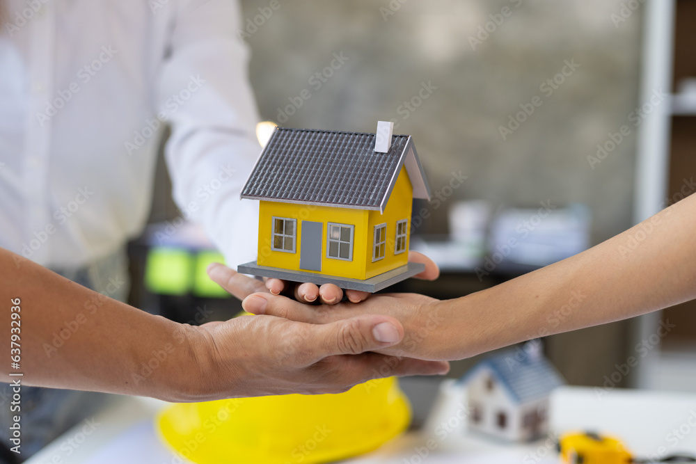 Handshake, Colleagues meeting in the office of architect and construction engineer working together 