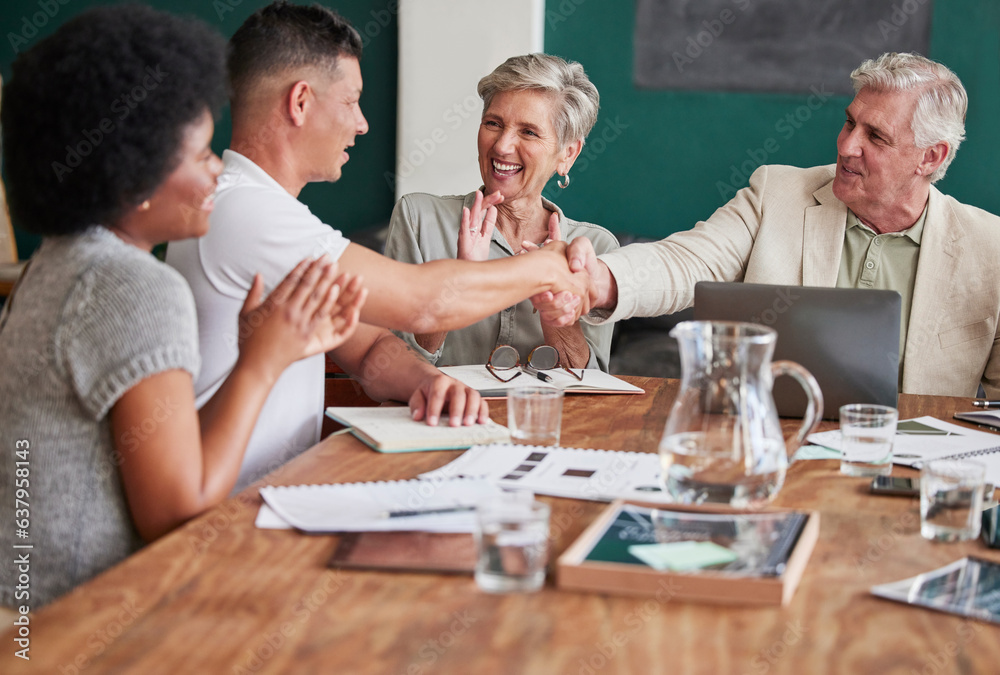 Applause, promotion and bonus with business people shaking hands in an office during a meeting. Succ