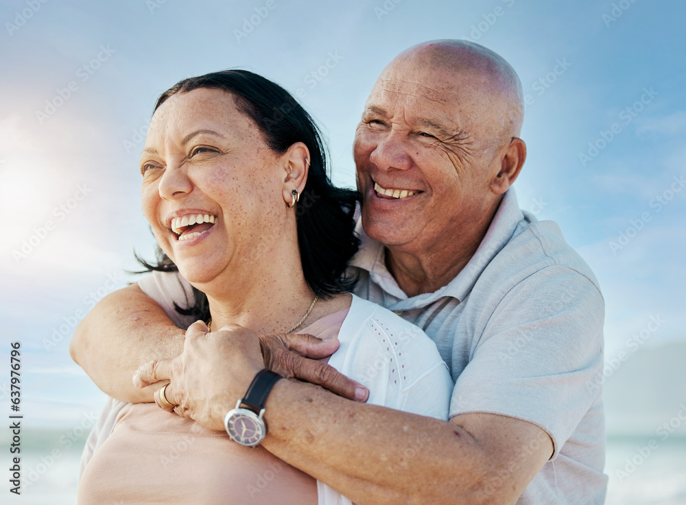 Hug, happy and thinking couple at beach for travel, vacation and at the ocean together. Smile, love 