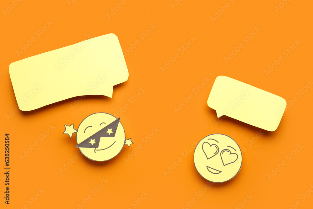 Paper faces with blank speech bubbles on orange background