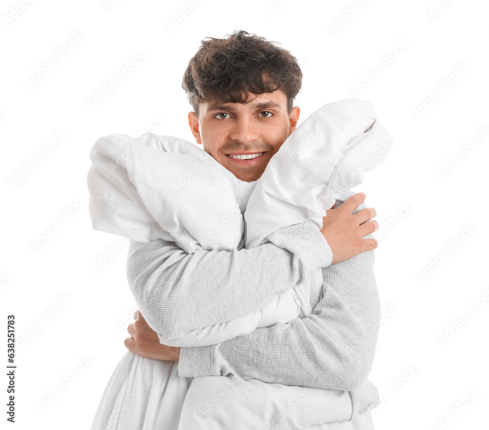 Handsome happy man with soft blanket on white background