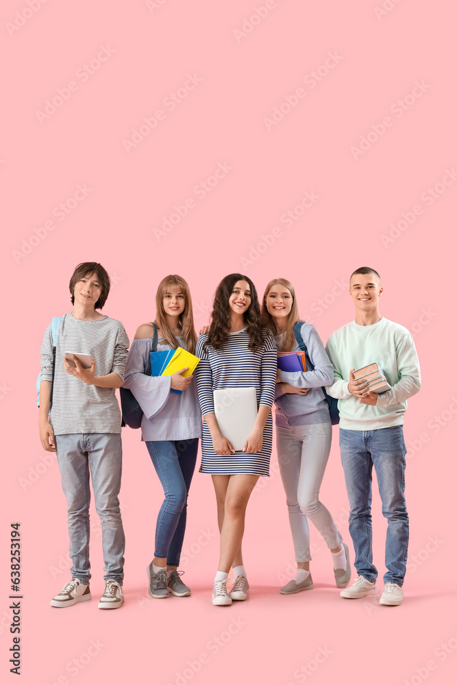 Group of students on pink background