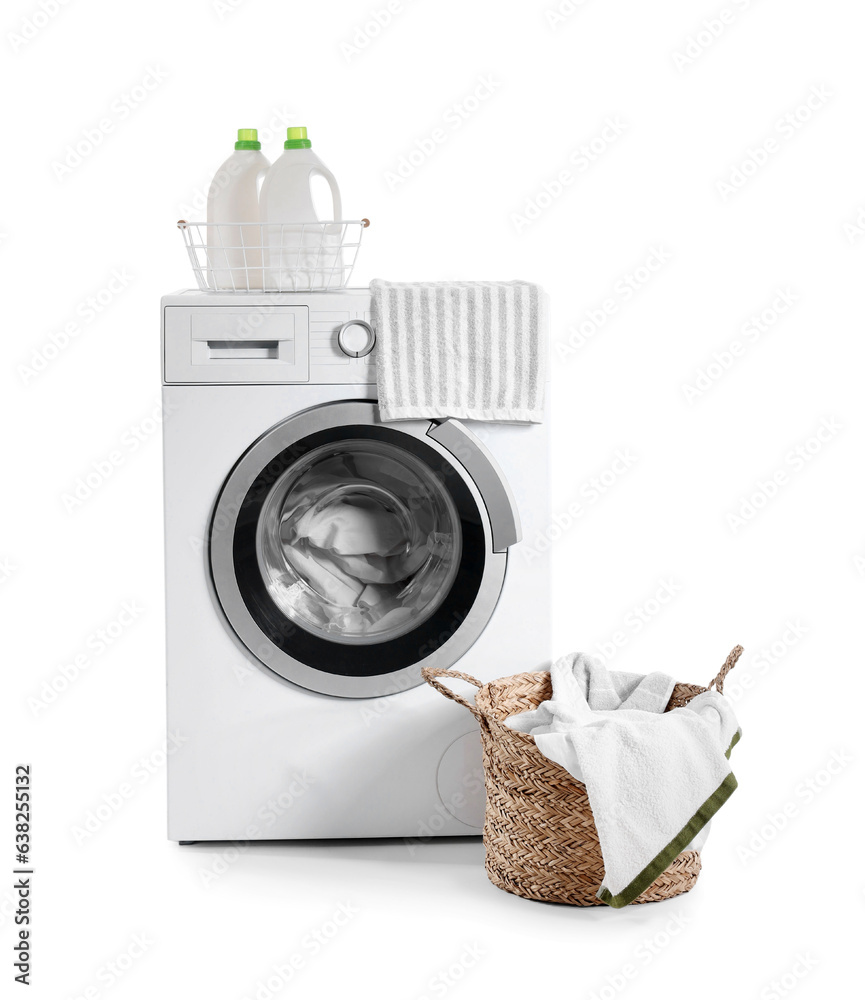 Washing machine, bottles of detergent and basket with dirty laundry isolated on white background