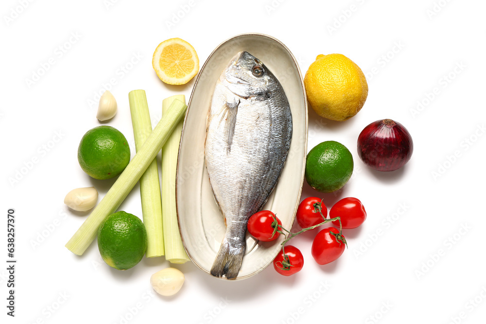 Fresh fish with vegetables and citrus fruits on white background