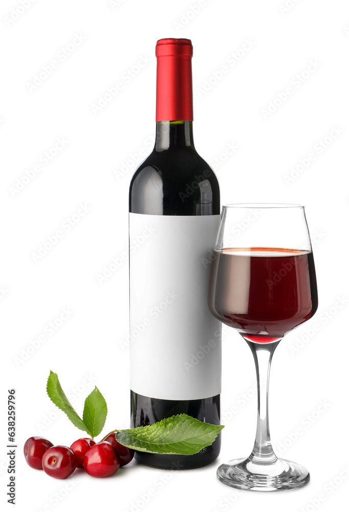 Glass and bottle of sweet cherry liqueur with berries on white background