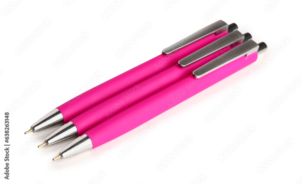 Pink pens on white background