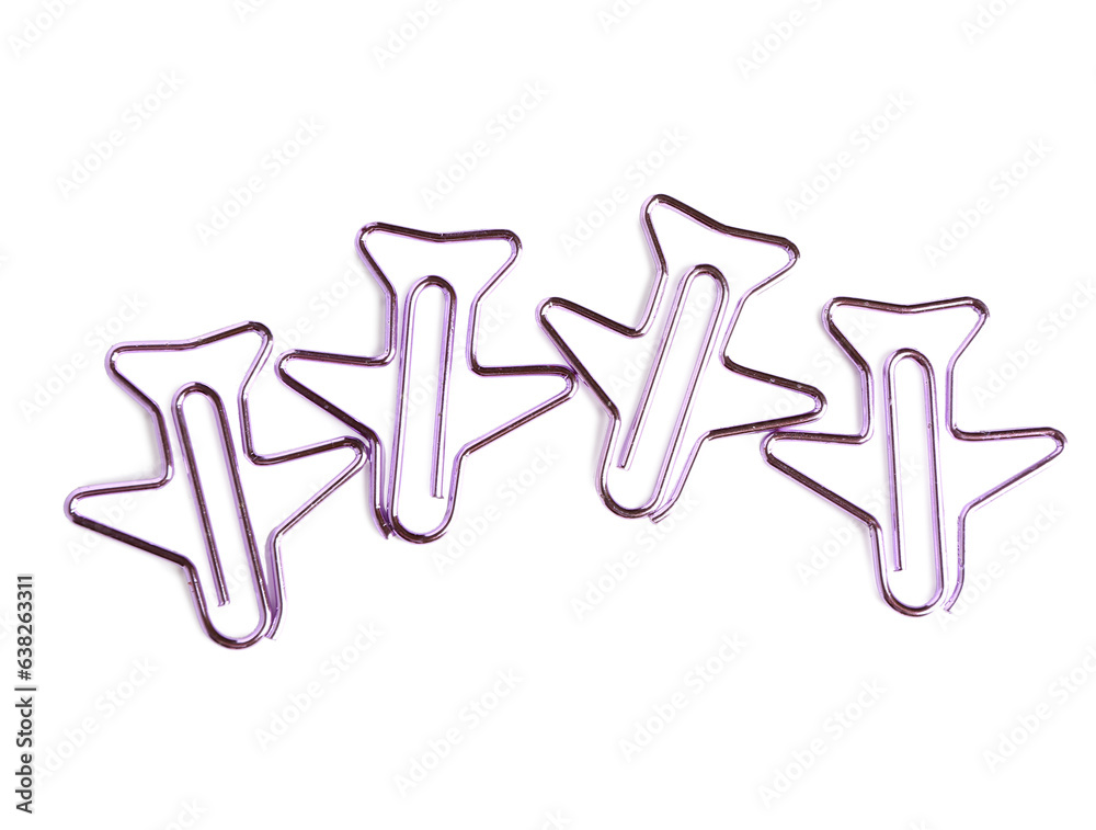 Purple paper clips in shape of airplanes on white background