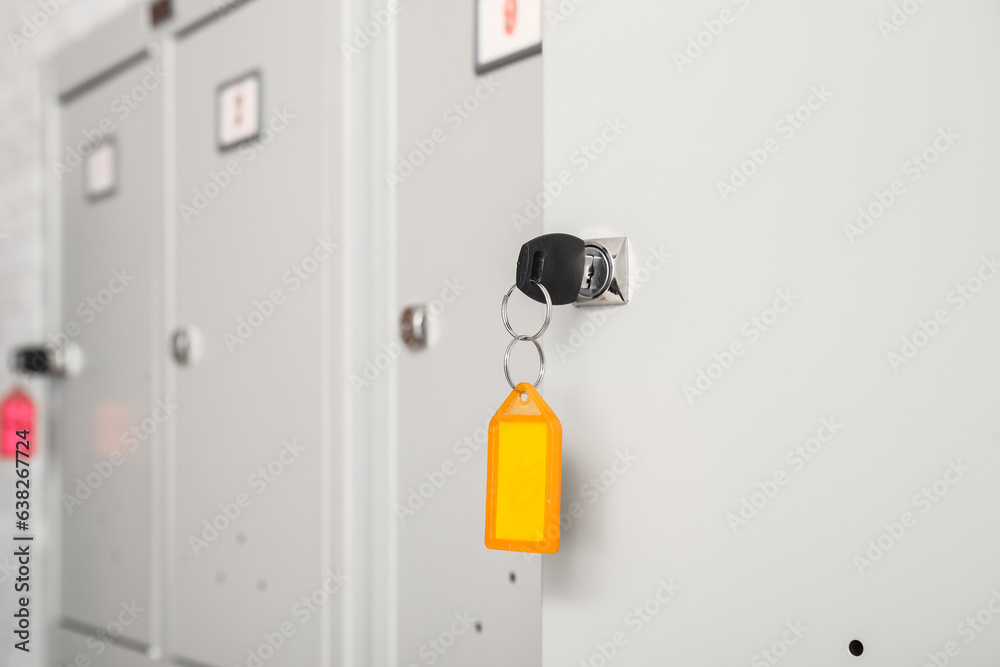 Modern locker with key, closeup