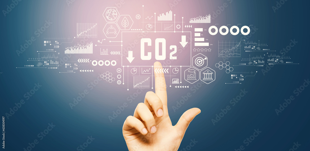 Reduce CO2 theme with hand pressing a button on a technology screen