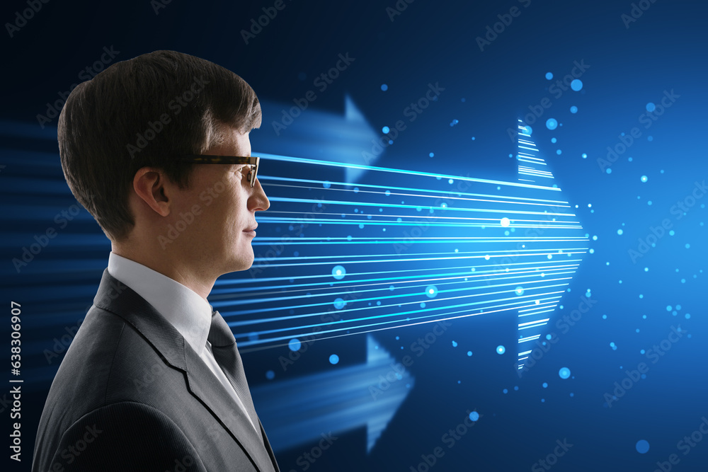 Side view of attractive young european businessman with glasses and glowing digital arrow made up of