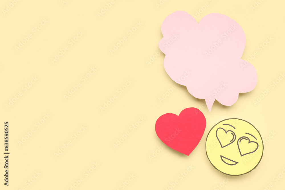 Paper face with blank speech bubble and heart on yellow background