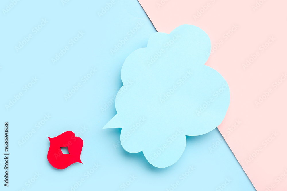 Paper lips with blank speech bubble on blue and pink background