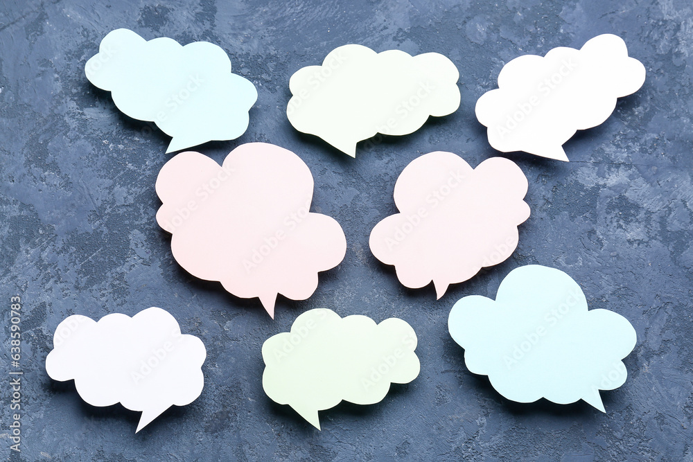 Blank speech bubbles on dark blue background