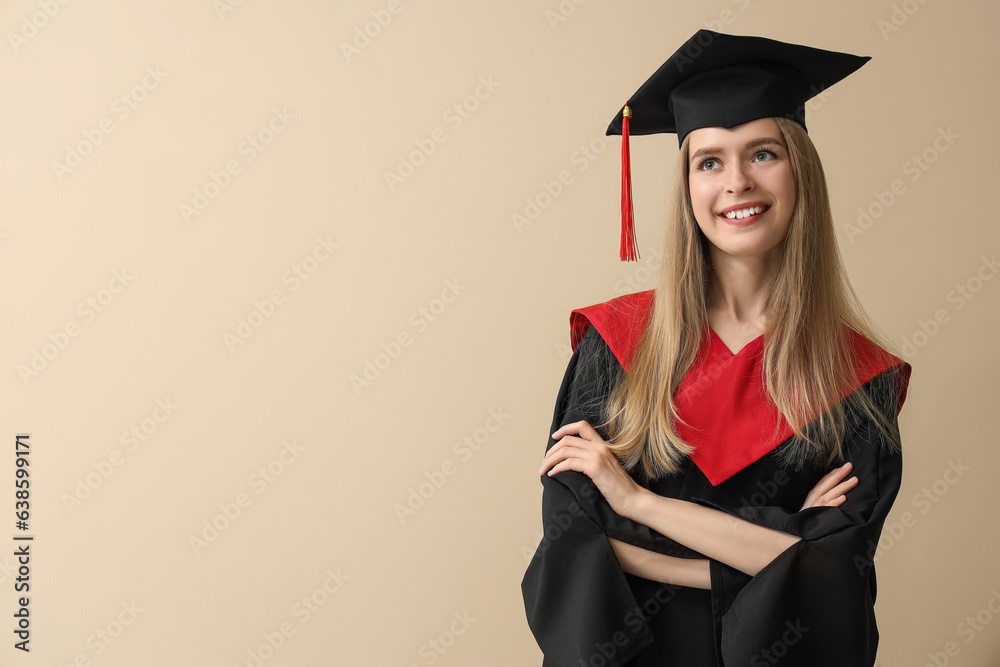 Female graduate student on beige background