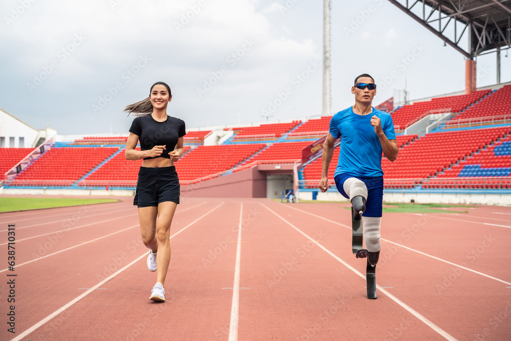 Asian athlete with prosthetic blades and trainer workout in stadium. 