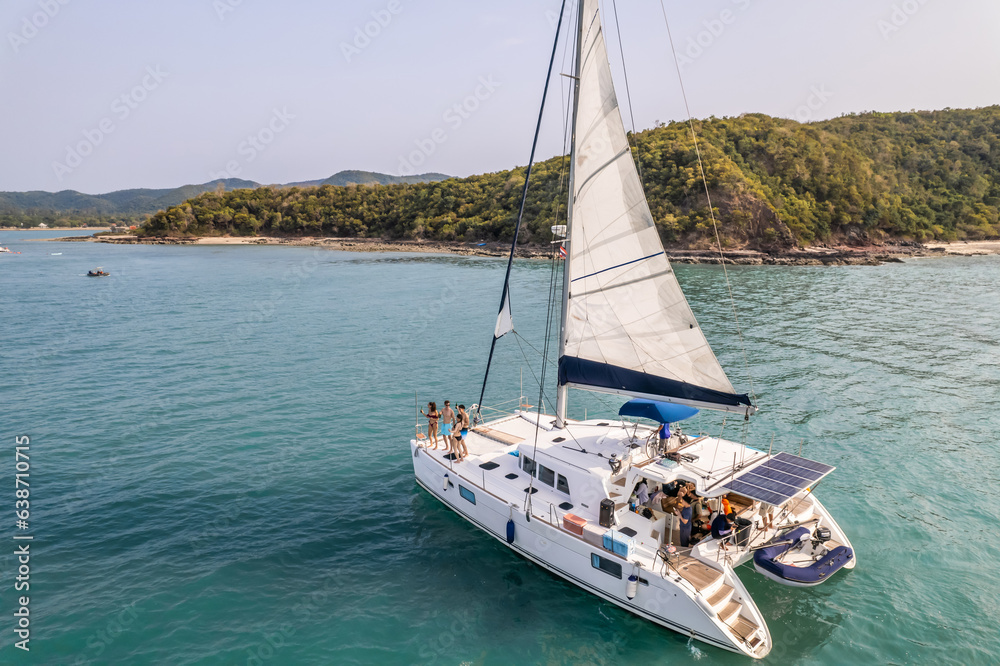 Aerial view of luxury private motor yacht on the ocean during summer. 