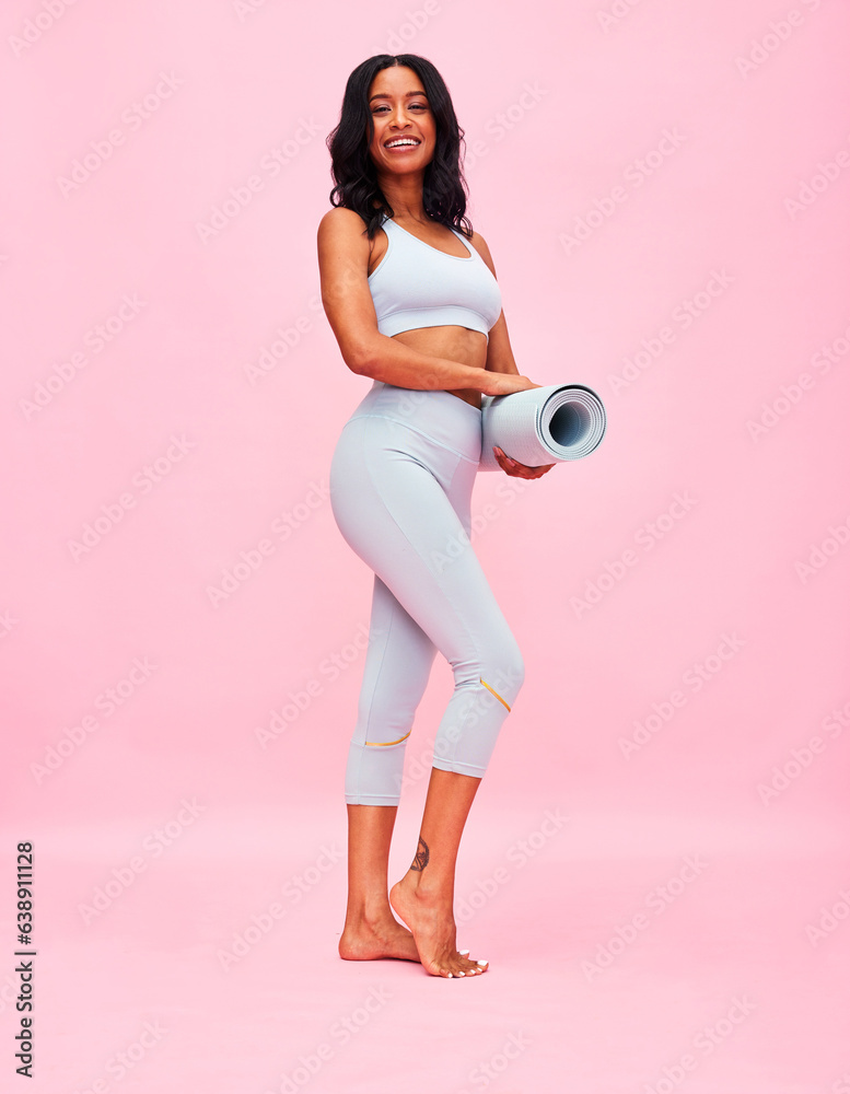 Yoga mat, woman and smile of portrait in studio for healthy body, exercise or fitness on pink backgr